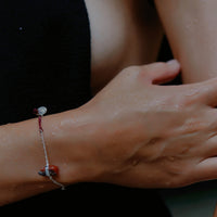 Healing stones bracelet collection CARNELIAN BRACELET hand-braided dark red cord mixed with recycled sterling silver link chain and the carnelian crystal. Unisex. Some of its emotional benefits include reducing jealousy and envy of others and their possessions.