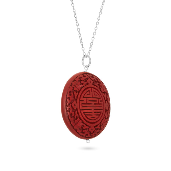 VIKAjewels CHINESE NECKLACE this necklace was inspired by travelling through Hong Kong the pendant is Ø5.5cm cinnabar carved wood silver details were made from 925 recycled sterling silver available with 60cm Snake chain and 50cm link chain handmade in Bali